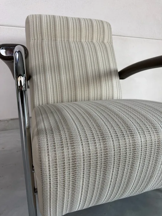 Leolux Scylla fauteuil met hocker, stof en leer — Fauteuil (foto 6)